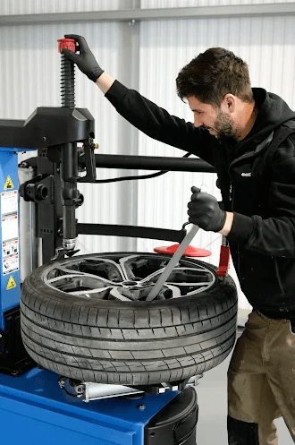 Mechanic working on a car